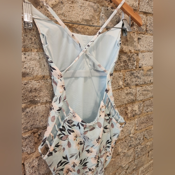 One piece swimsuit. Baby blue, floral print. Crisscross back and side cut outs - Picture 3 of 5